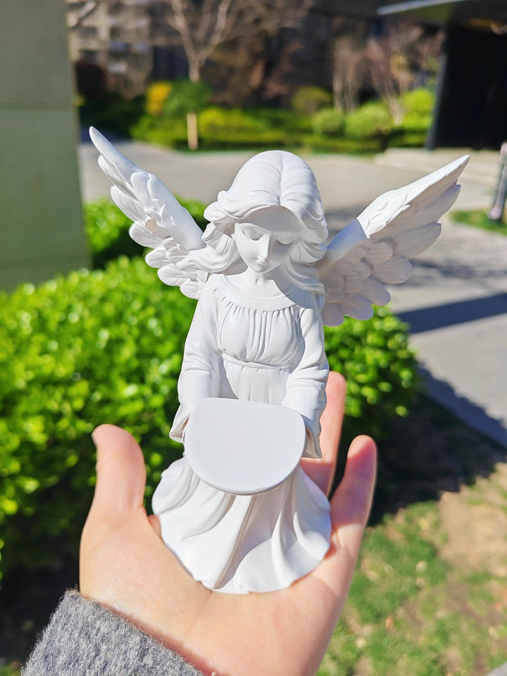 Angel candle holder